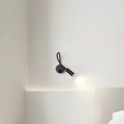 Lumio Flexible black LED wall lamp for indoor use